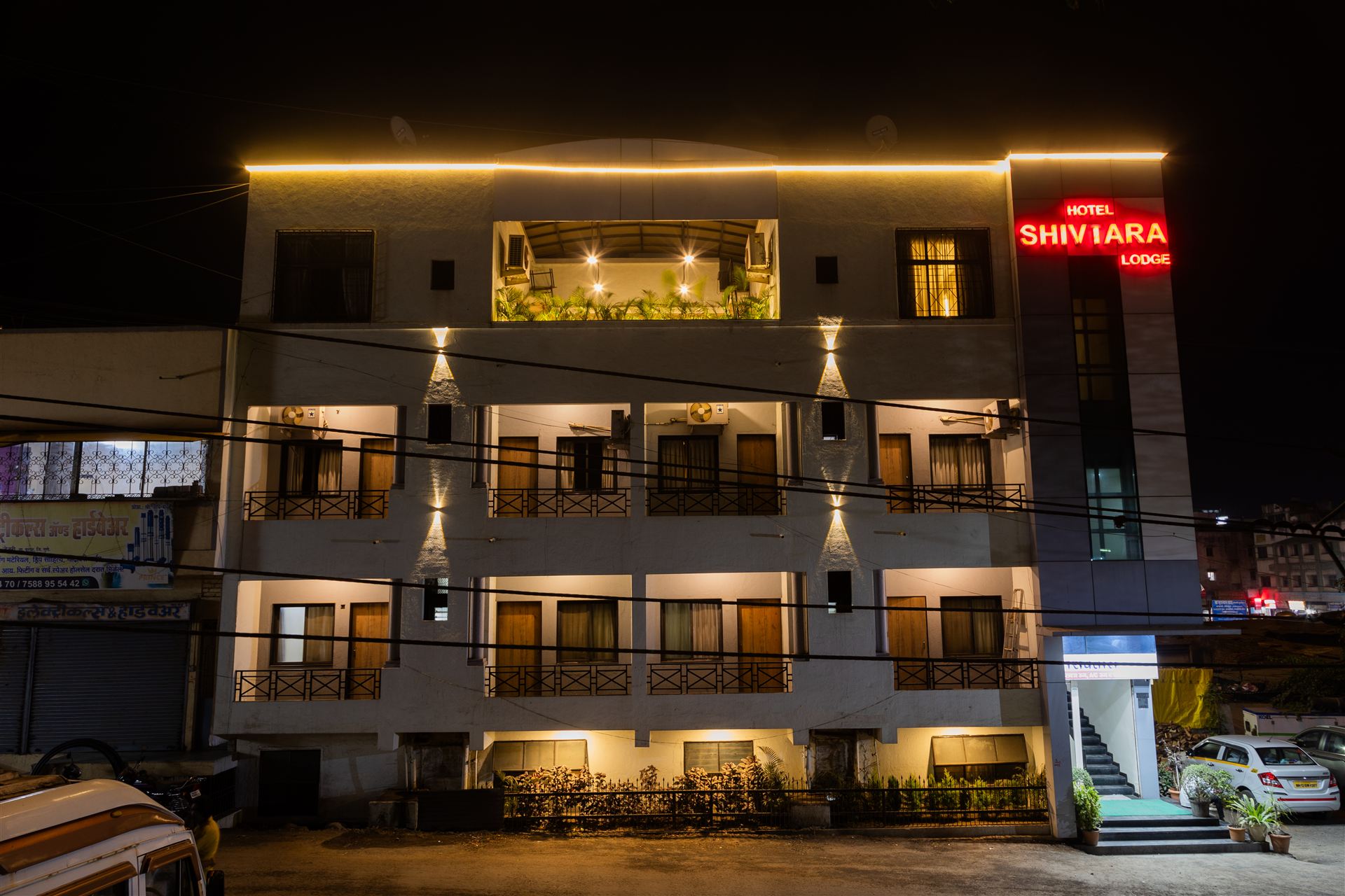 Hotel Shivtara front view at night with warm lighting