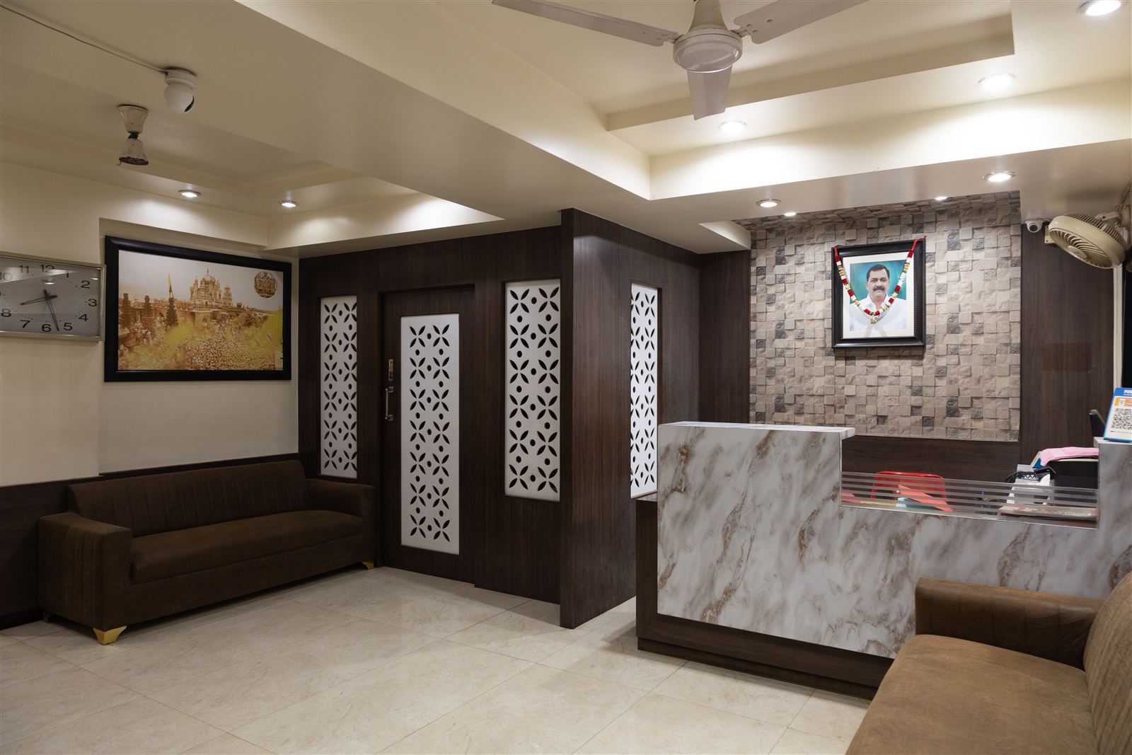 Lobby with seating and decorative panels