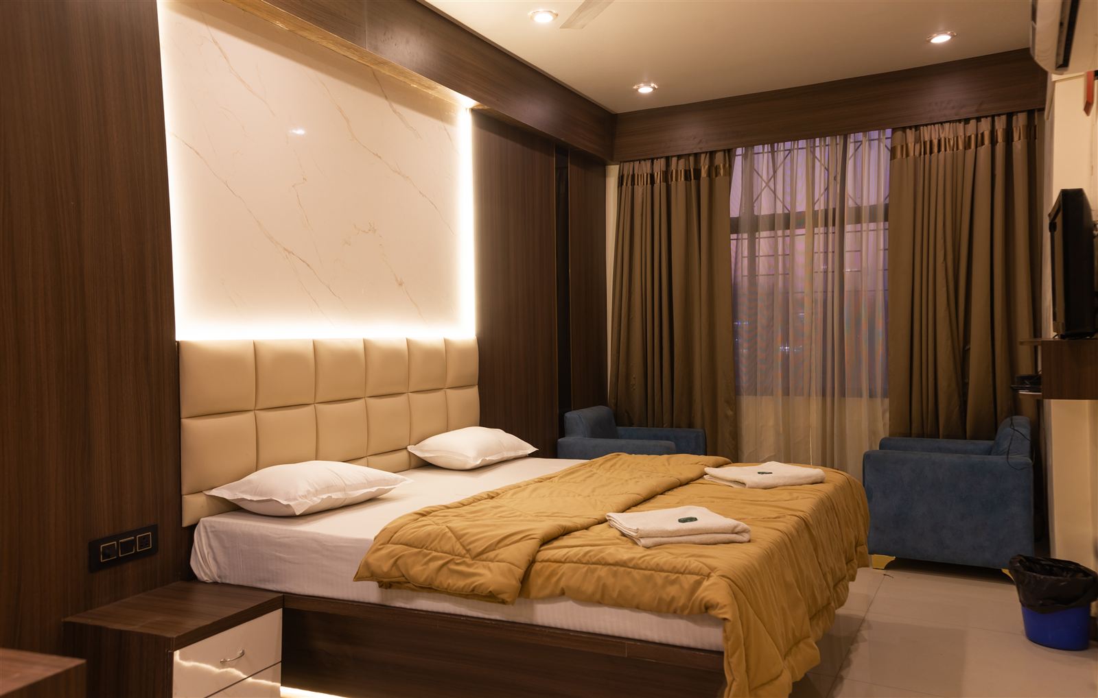 Premium room with backlit headboard and sofa